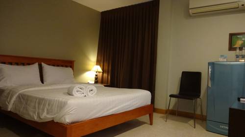 Imagen de la habitación del Hotel Mango Bedroom Inn. Foto 9