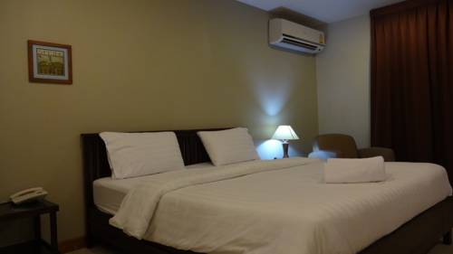 Imagen de la habitación del Hotel Mango Bedroom Inn. Foto 11