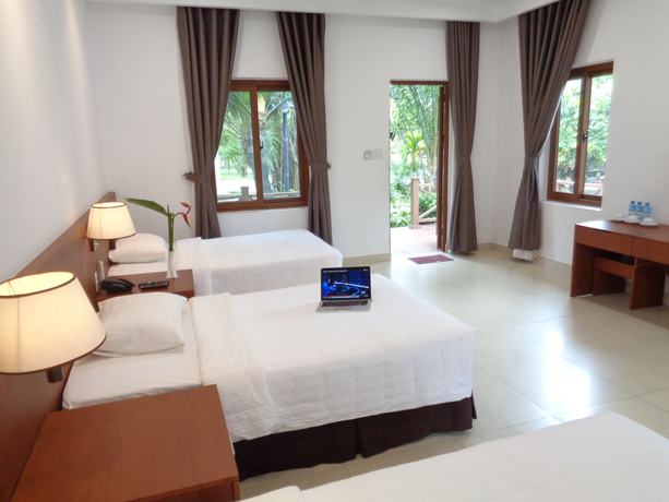 Imagen de la habitación del Hotel Mango Garden Resort. Foto 2