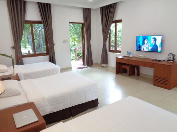Imagen de la habitación del Hotel Mango Garden Resort. Foto 3