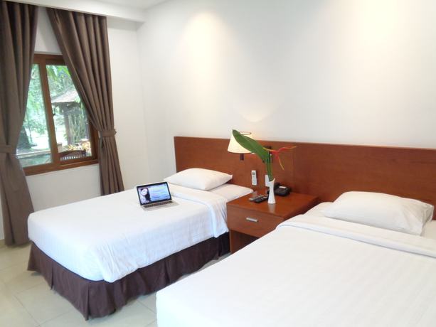 Imagen de la habitación del Hotel Mango Garden Resort. Foto 5