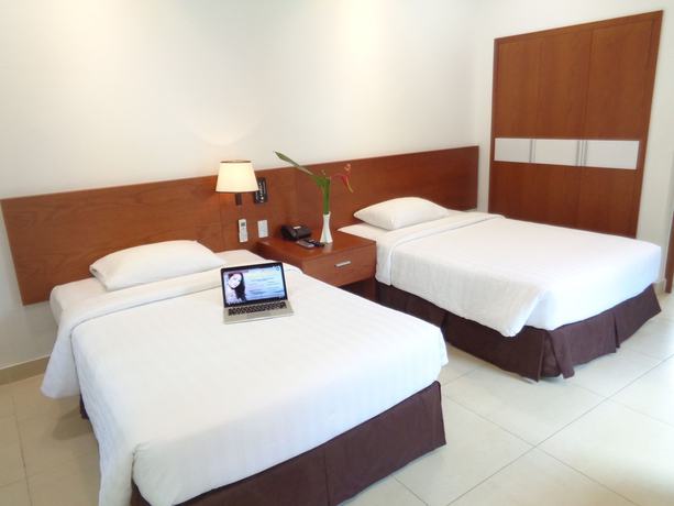Imagen de la habitación del Hotel Mango Garden Resort. Foto 6