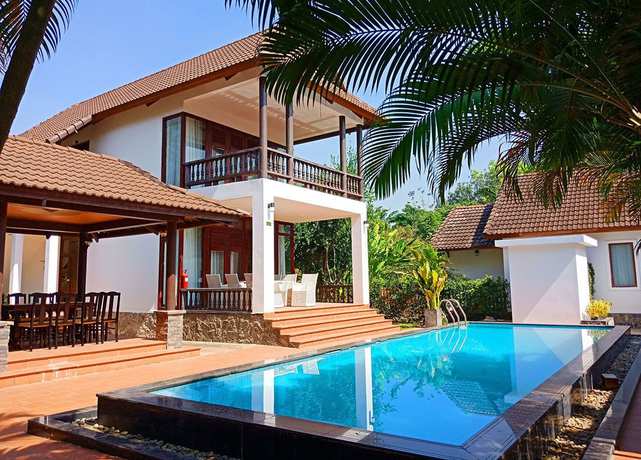 Imagen de la habitación del Hotel Mango Garden Resort. Foto 7