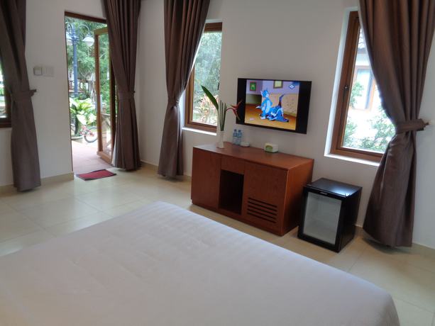 Imagen de la habitación del Hotel Mango Garden Resort. Foto 9