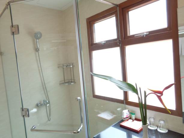 Imagen de la habitación del Hotel Mango Garden Resort. Foto 11