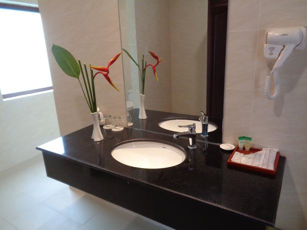 Imagen de la habitación del Hotel Mango Garden Resort. Foto 12