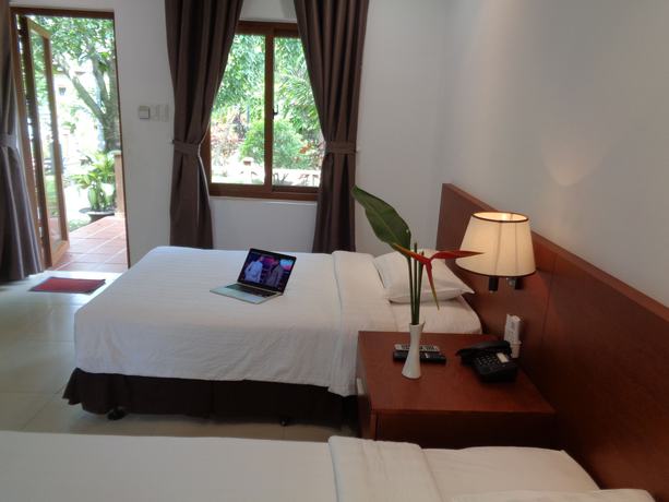 Imagen de la habitación del Hotel Mango Garden Resort. Foto 14