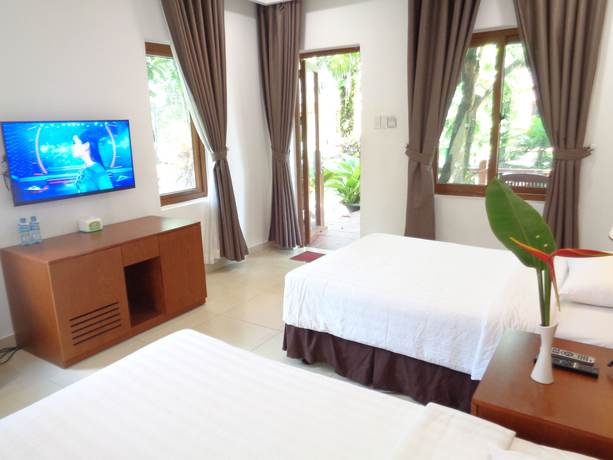 Imagen de la habitación del Hotel Mango Garden Resort. Foto 17