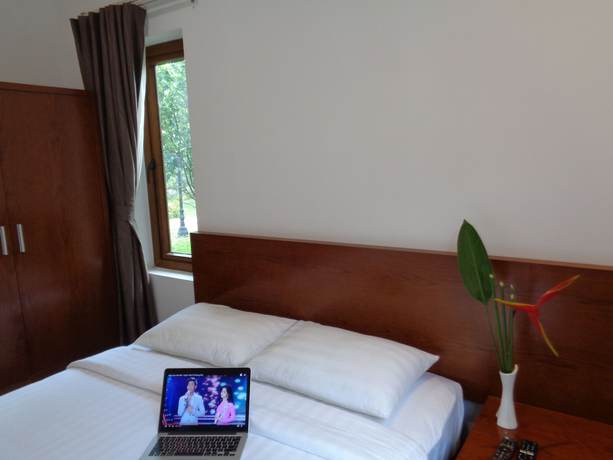 Imagen de la habitación del Hotel Mango Garden Resort. Foto 18