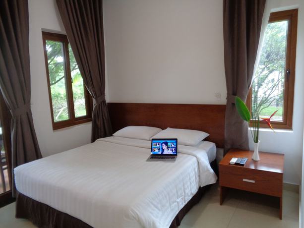 Imagen de la habitación del Hotel Mango Garden Resort. Foto 19