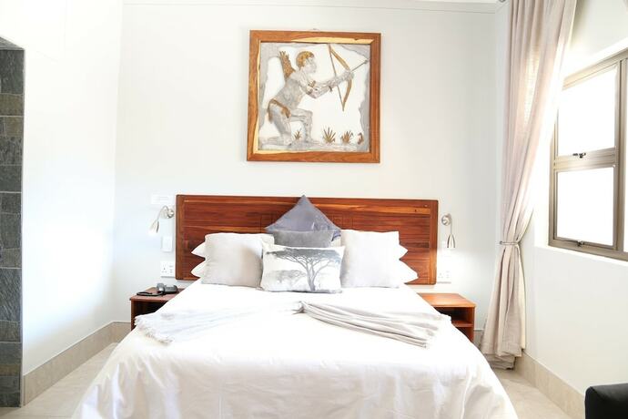 Imagen de la habitación del Hotel Mango Guesthouse. Foto 11