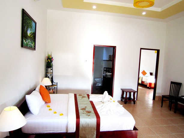 Imagen de la habitación del Hotel Mango Home Riverside. Foto 5