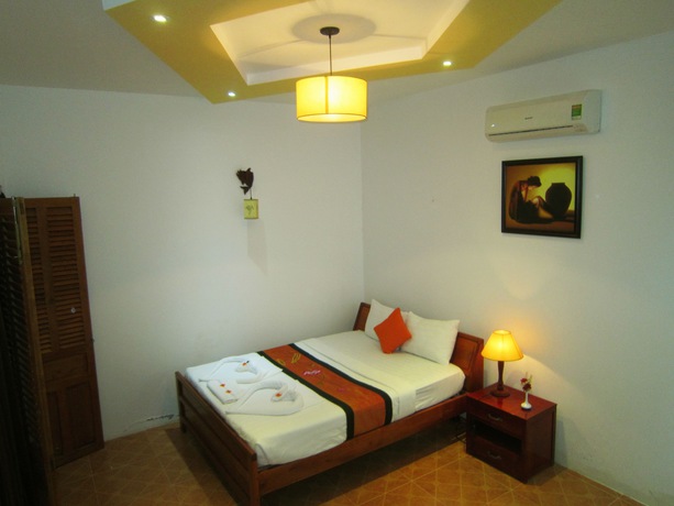 Imagen de la habitación del Hotel Mango Home Riverside. Foto 9