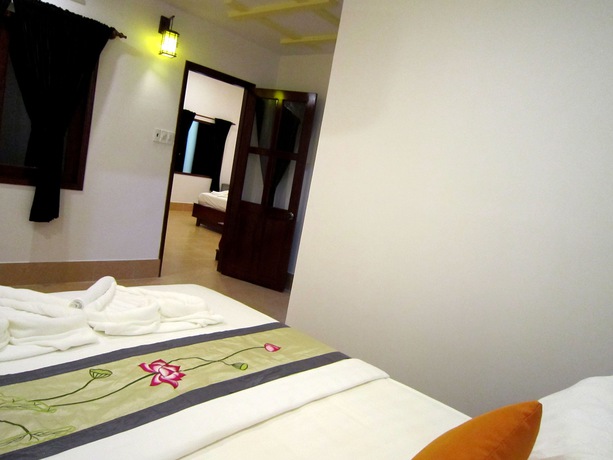 Imagen de la habitación del Hotel Mango Home Riverside. Foto 13