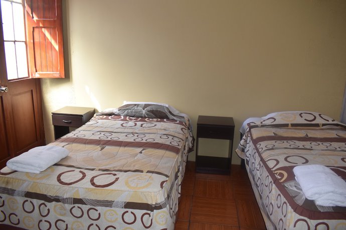 Imagen de la habitación del Hotel Mango Hostel Bed and Breakfast. Foto 9