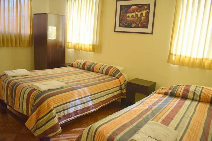 Imagen de la habitación del Hotel Mango Hostel Bed and Breakfast. Foto 10