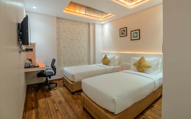 Imagen de la habitación del Hotel Mango Hotels Prangan,bhubaneshwar. Foto 16