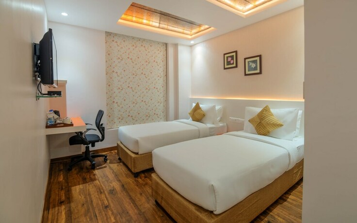 Imagen de la habitación del Hotel Mango Hotels Prangan,bhubaneshwar. Foto 22
