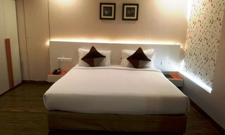 Imagen de la habitación del Hotel Mango Hotels Prangan,bhubaneshwar. Foto 23