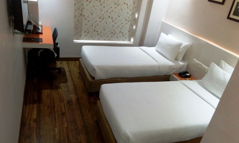 Imagen de la habitación del Hotel Mango Hotels Prangan,bhubaneshwar. Foto 24