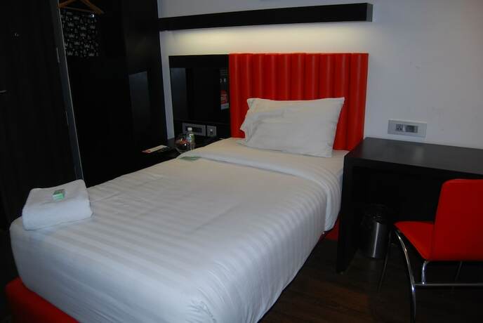 Imagen de la habitación del Hotel Mango Hotels Tune, Ahmedabad. Foto 19