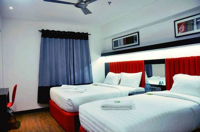 Imagen de la habitación del Hotel Mango Hotels Tune, Ahmedabad. Foto 22