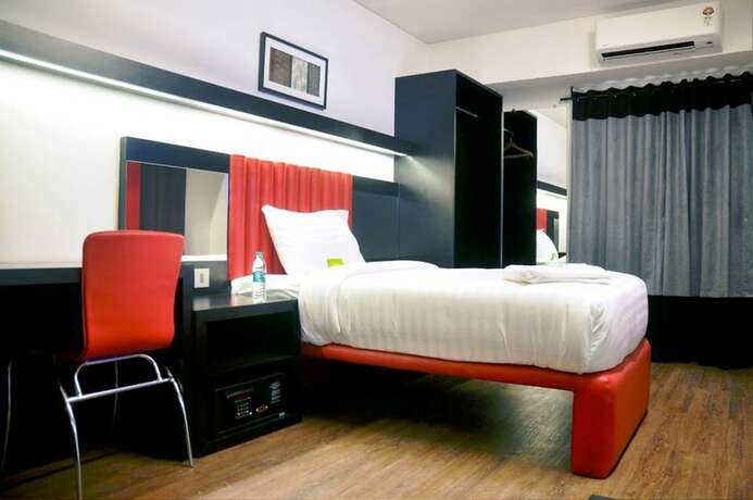 Imagen de la habitación del Hotel Mango Hotels Tune, Ahmedabad. Foto 24