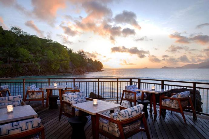 Imagen del bar/restaurante del Hotel Mango House Seychelles, LXR Hotels & Resorts. Foto 7