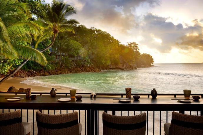 Imagen del bar/restaurante del Hotel Mango House Seychelles, LXR Hotels & Resorts. Foto 8