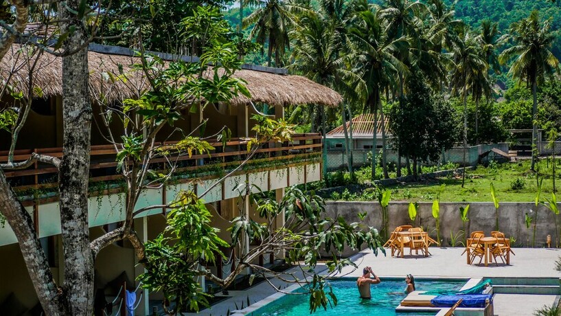 Imagen de la piscina del Hotel Mango Lodge. Foto 40