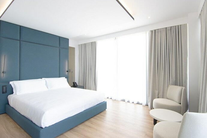 Imagen de la habitación del Hotel Mango Luxury Resorts. Foto 26
