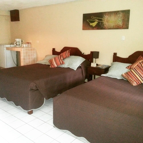 Imagen de la habitación del Hotel Mango Mar. Foto 12