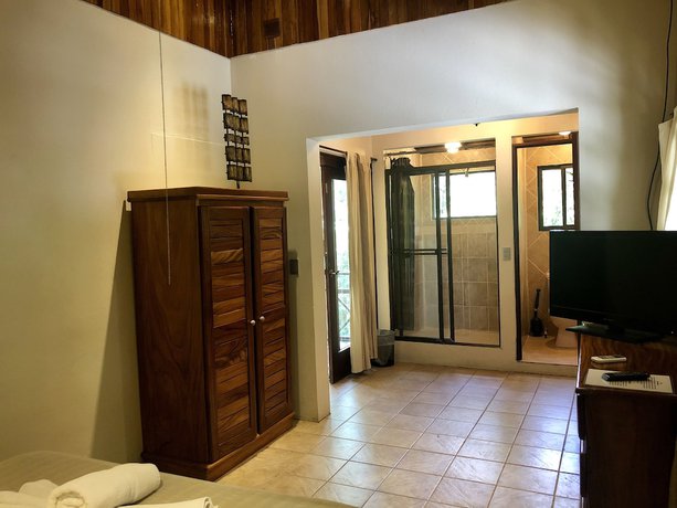 Imagen de la habitación del Hotel Mango Moon Villa. Foto 4