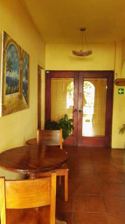 Imagen de la habitación del Hotel Mango Moon Villa. Foto 5