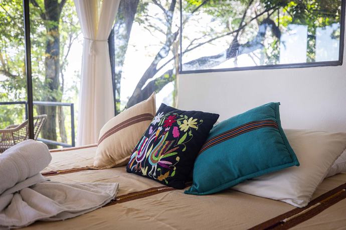 Imagen de la habitación del Hotel Mango Moon Villa. Foto 8