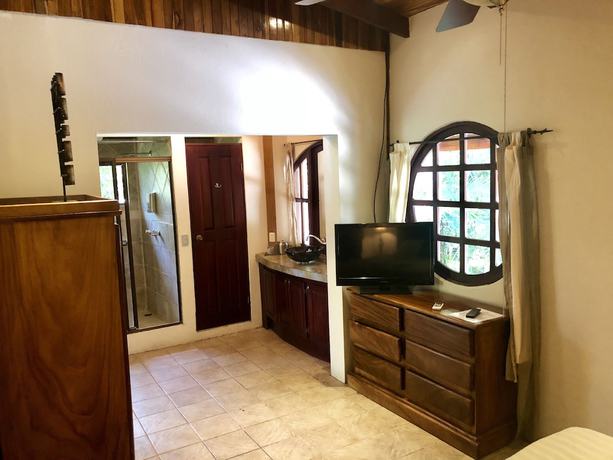 Imagen de la habitación del Hotel Mango Moon Villa. Foto 10