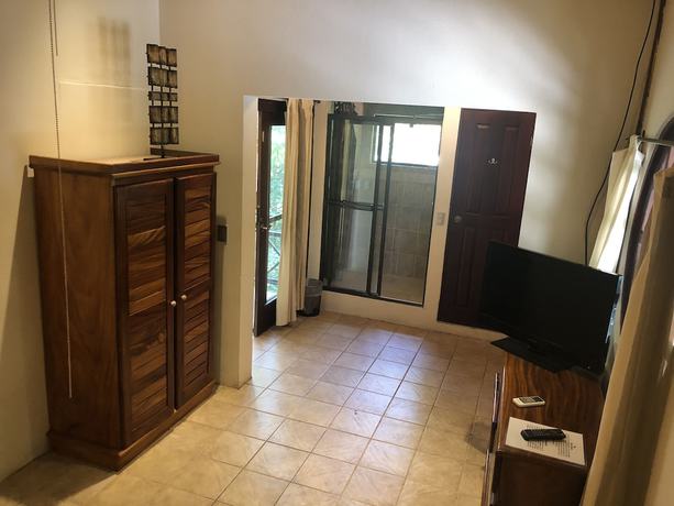 Imagen de la habitación del Hotel Mango Moon Villa. Foto 14