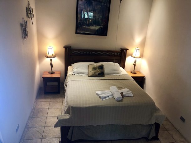 Imagen de la habitación del Hotel Mango Moon Villa. Foto 17