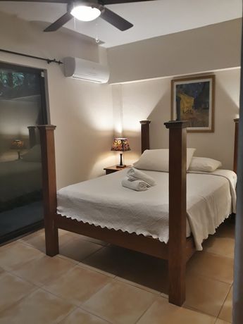 Imagen de la habitación del Hotel Mango Moon Villa. Foto 18