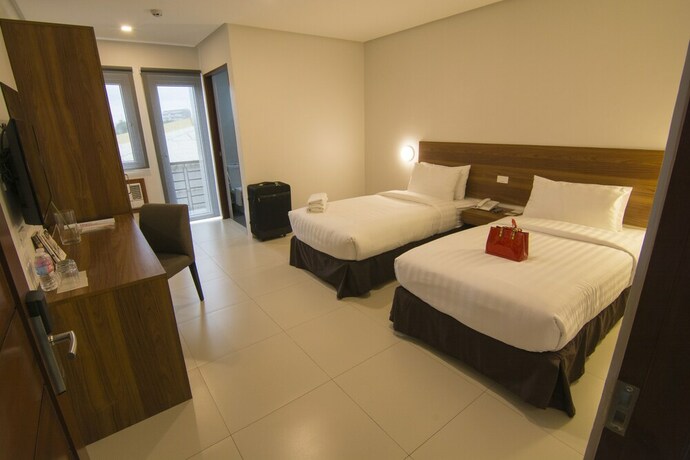 Imagen de la habitación del Hotel Mango Suites Cauayan. Foto 17