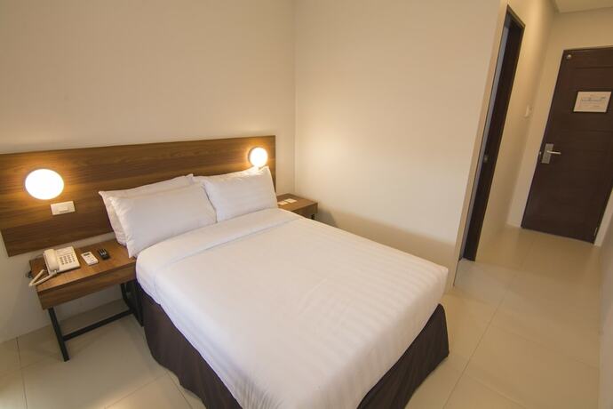 Imagen de la habitación del Hotel Mango Suites Cauayan. Foto 20