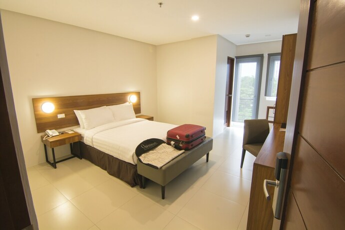 Imagen de la habitación del Hotel Mango Suites Cauayan. Foto 23