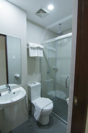 Imagen de la habitación del Hotel Mango Suites Cauayan. Foto 25