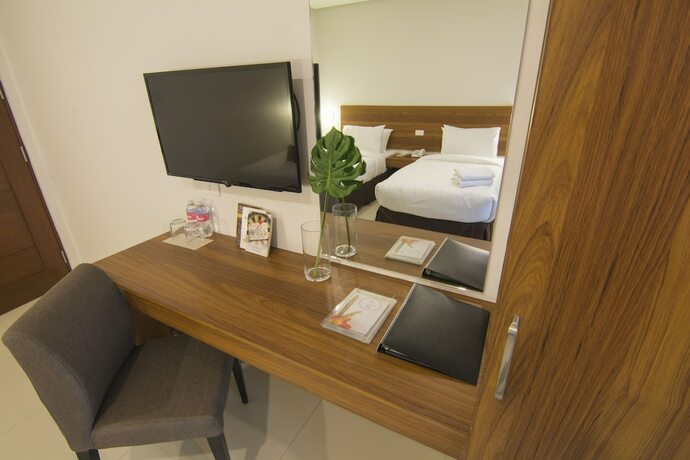 Imagen de la habitación del Hotel Mango Suites Cauayan. Foto 26