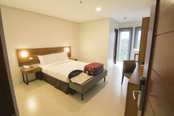 Imagen de la habitación del Hotel Mango Suites Cauayan. Foto 28