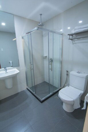 Imagen de la habitación del Hotel Mango Suites Cauayan. Foto 30