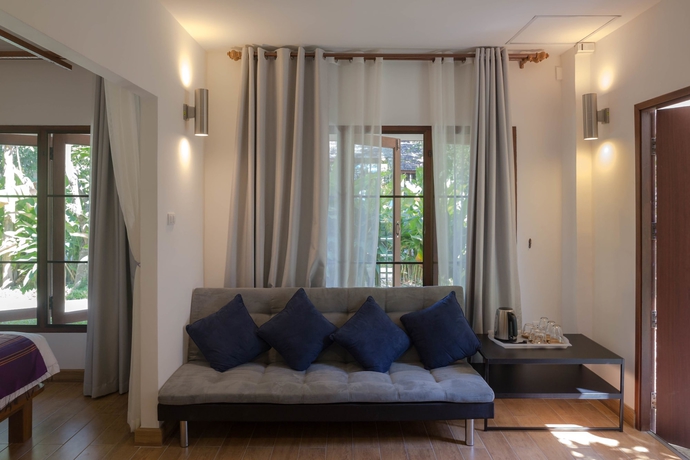 Imagen de los interiores del Hotel Mango T. Villa Chiang Mai Resort. Foto 18