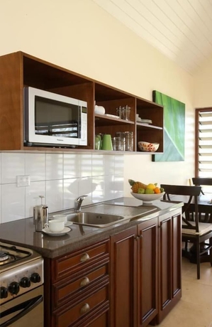 Imagen de la habitación del Hotel Mangoes Resort. Foto 18
