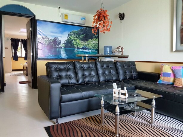 Imagen de la habitación del Hotel Mango's Beachfront Resort. Foto 17