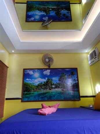 Imagen de la habitación del Hotel Mango's Beachfront Resort. Foto 19